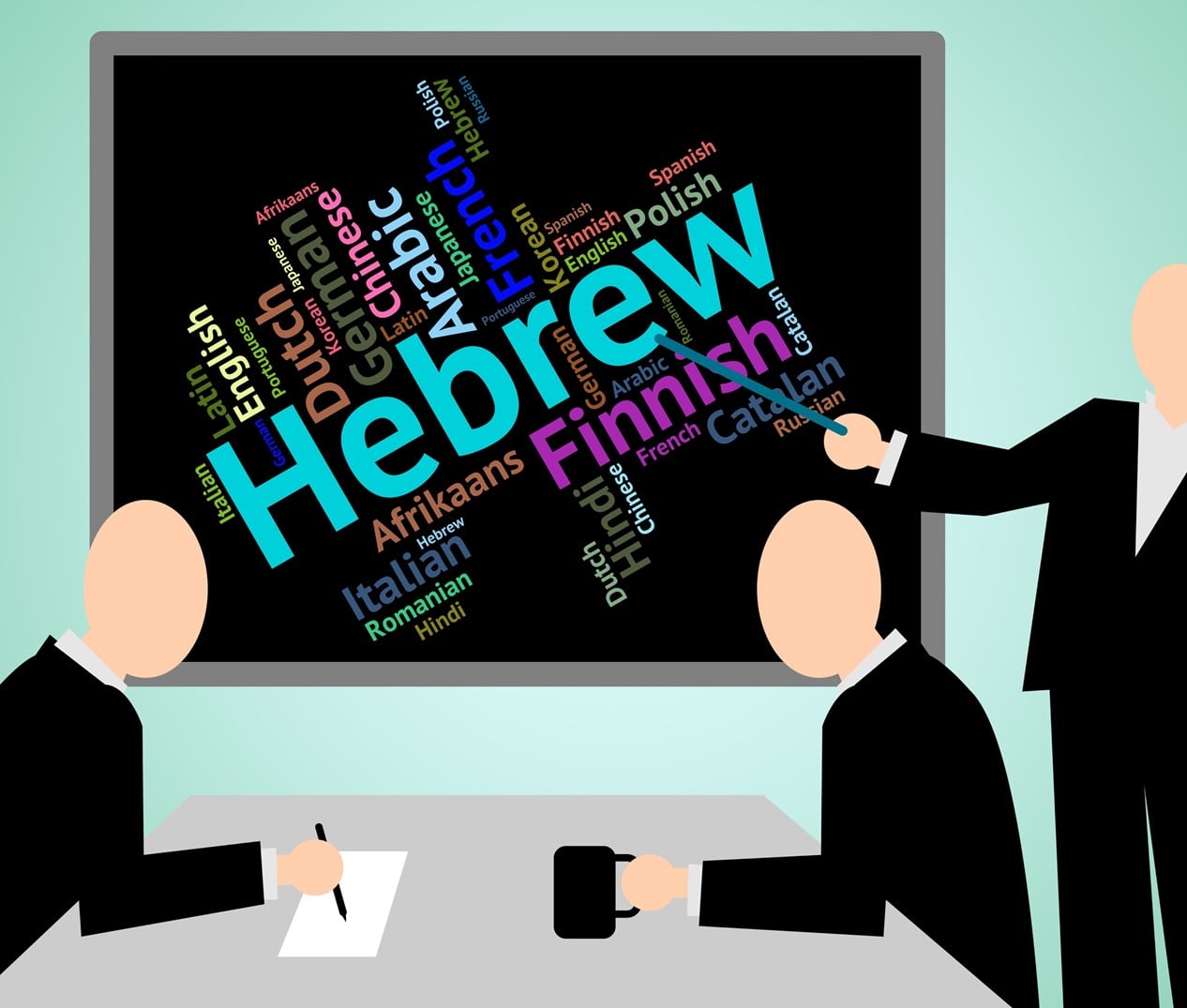 Man pointing to Hebrew on a blackboard