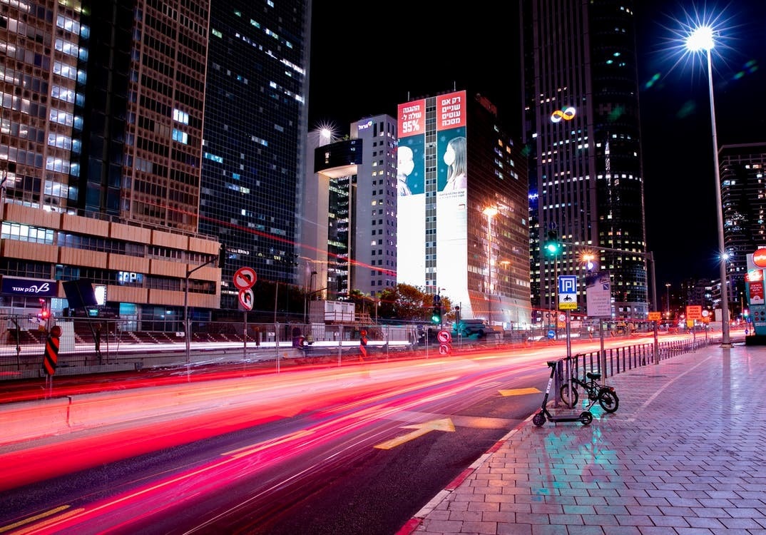 A nighttime photograph of a road in Tel Aviv-min