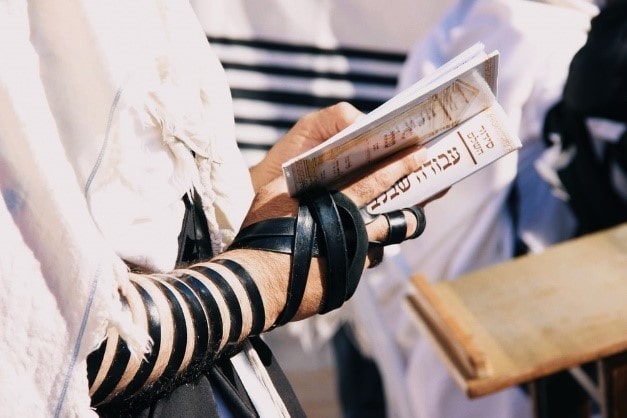 An Israeli reading a book in the Hebrew language