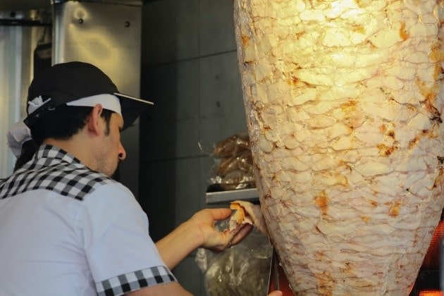 An Israeli chef making shawarma