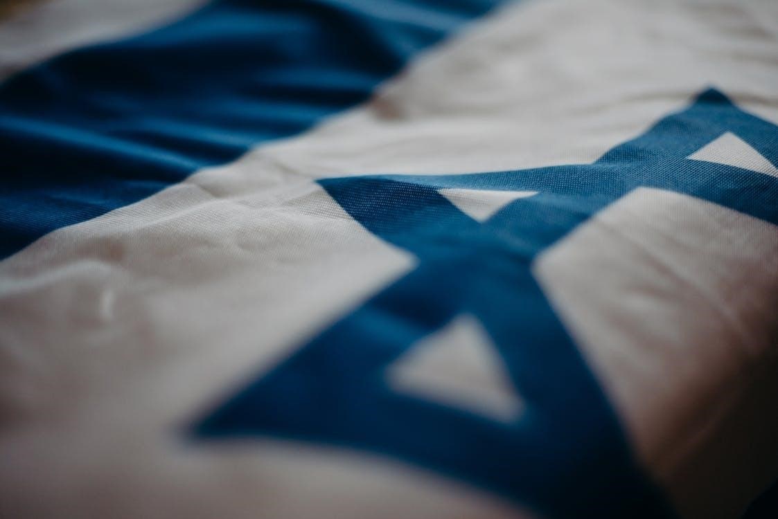 a close-up of an Israeli flag