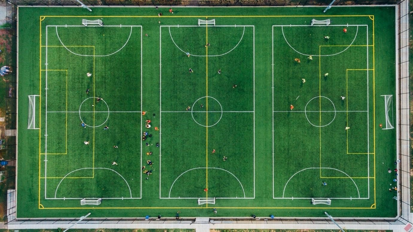 an aerial view of three soccer fields
